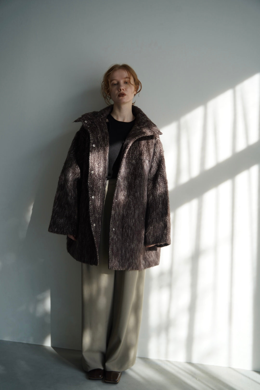 Stand shaggy over coat