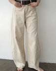 Belt curve denim pants
