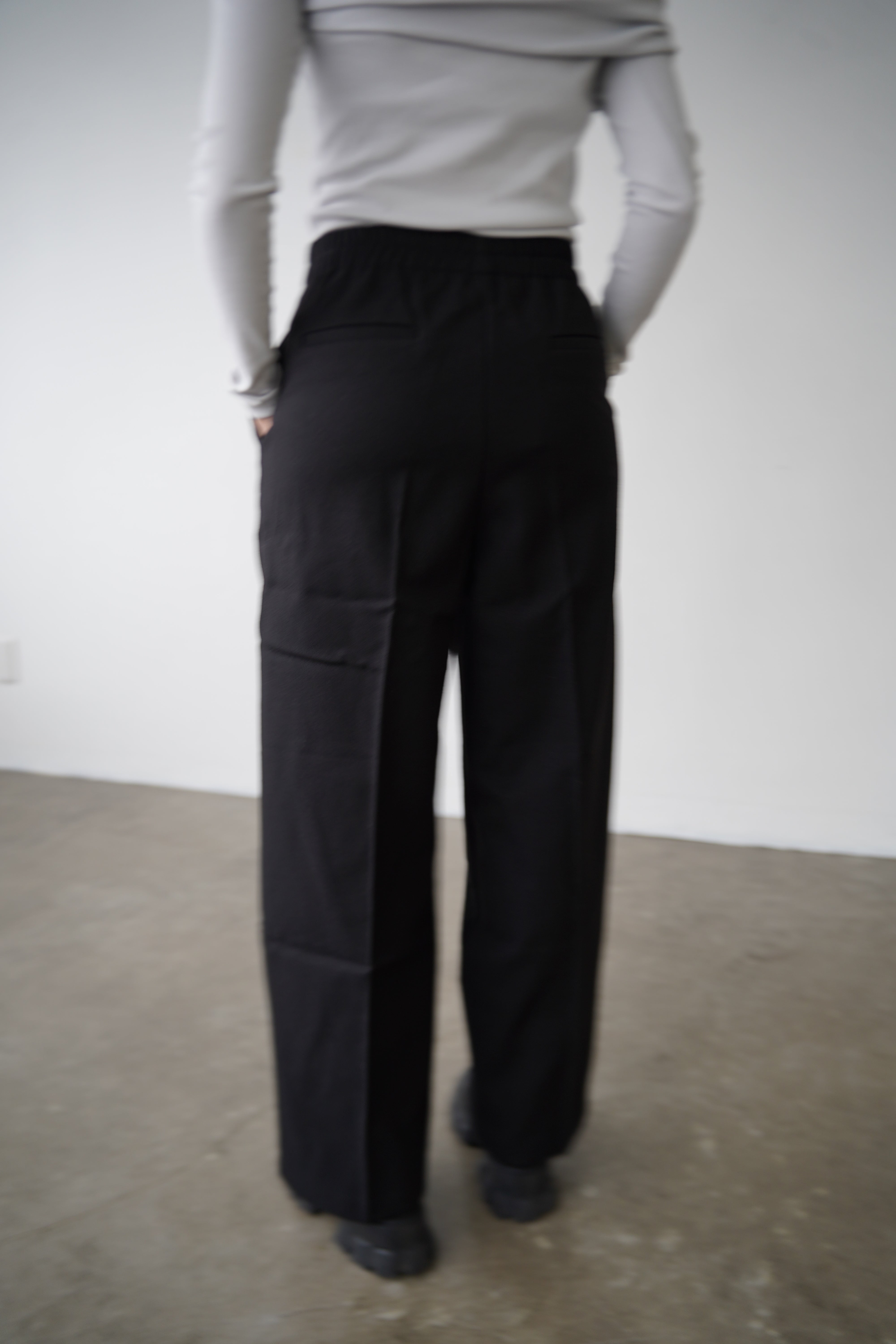 Button tuck slacks