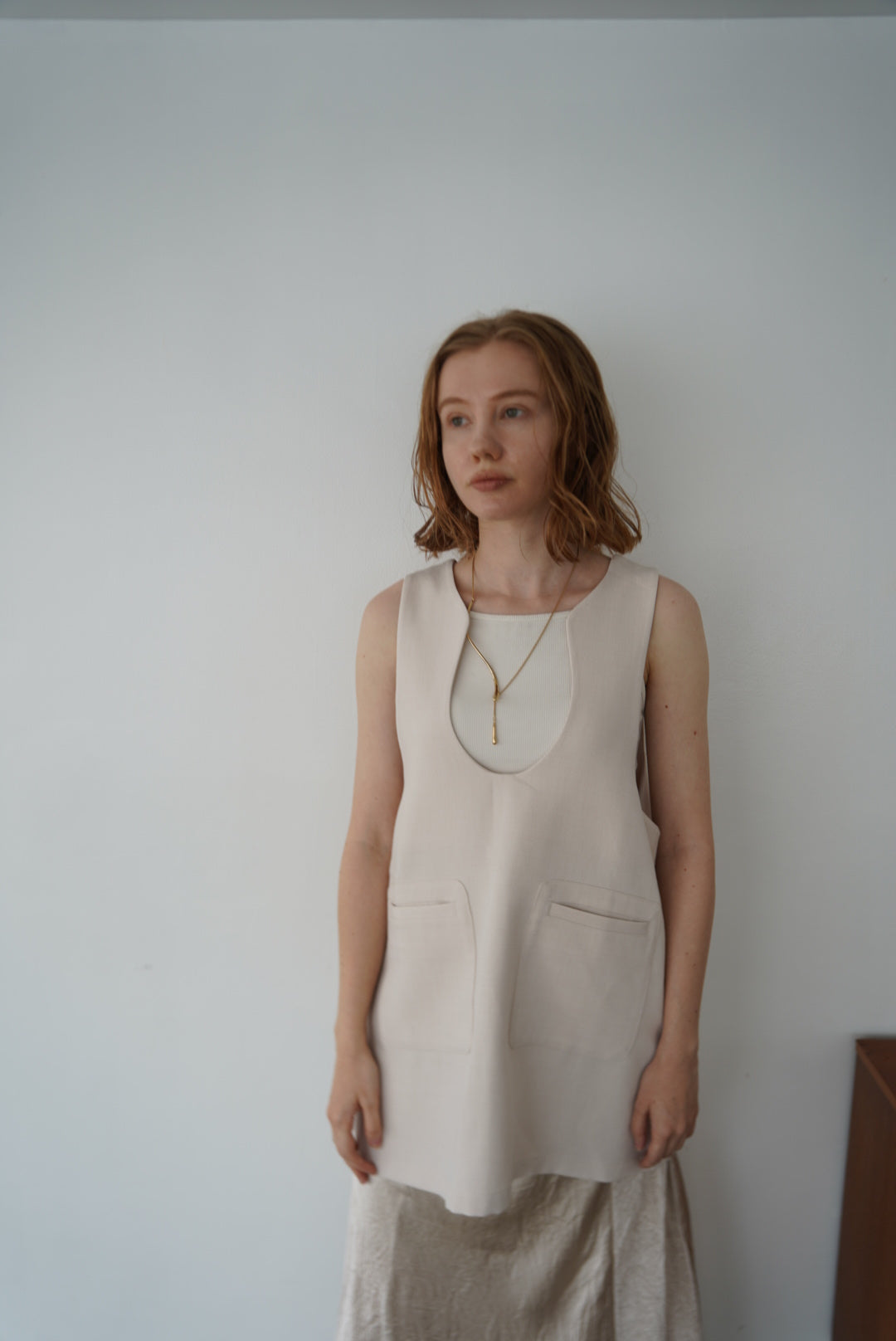 Wave neck vest