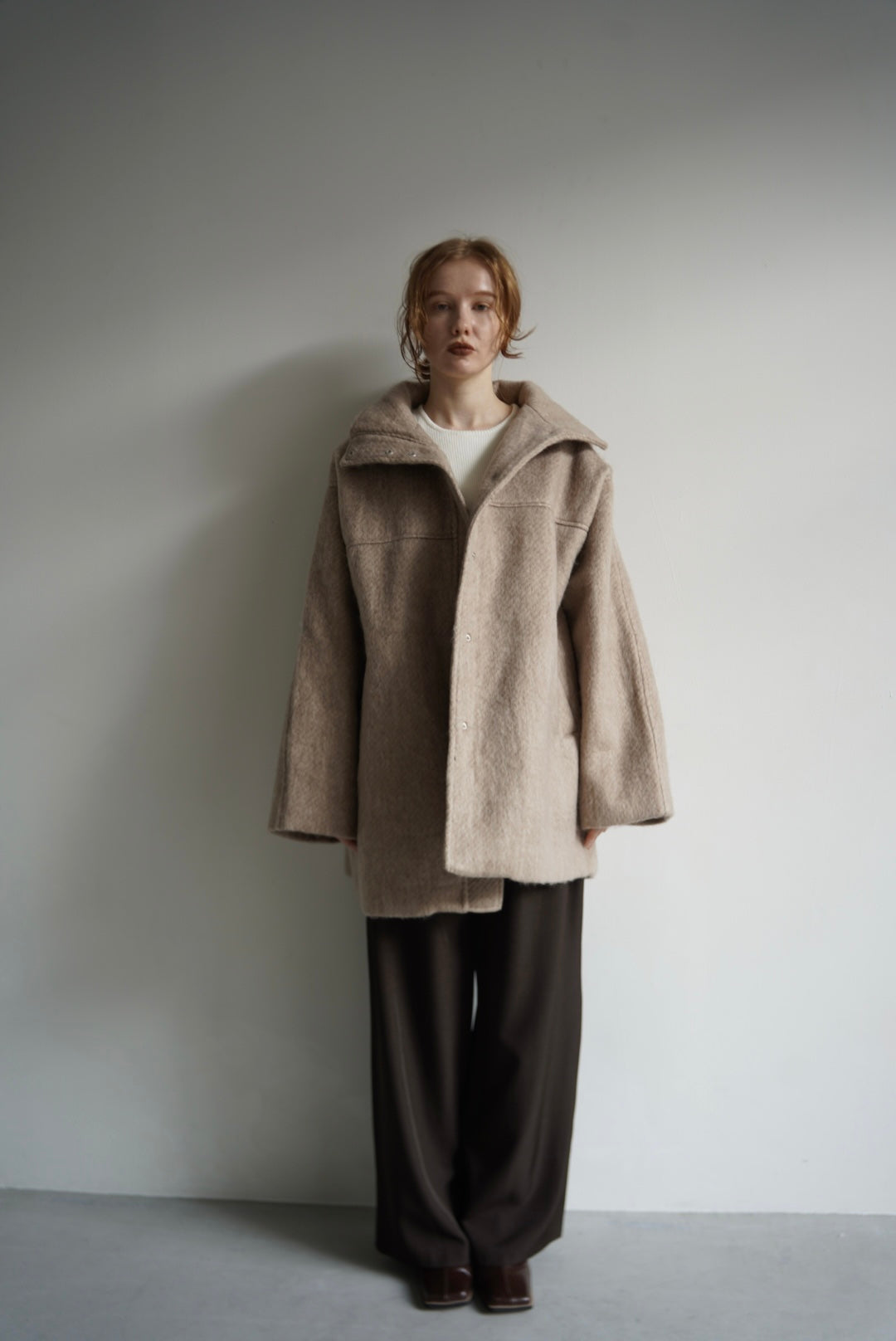 Stand shaggy over coat