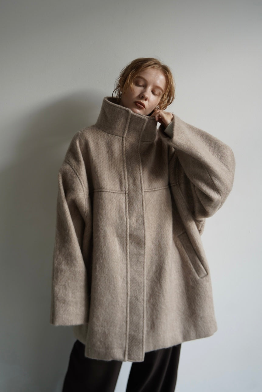 Stand shaggy over coat