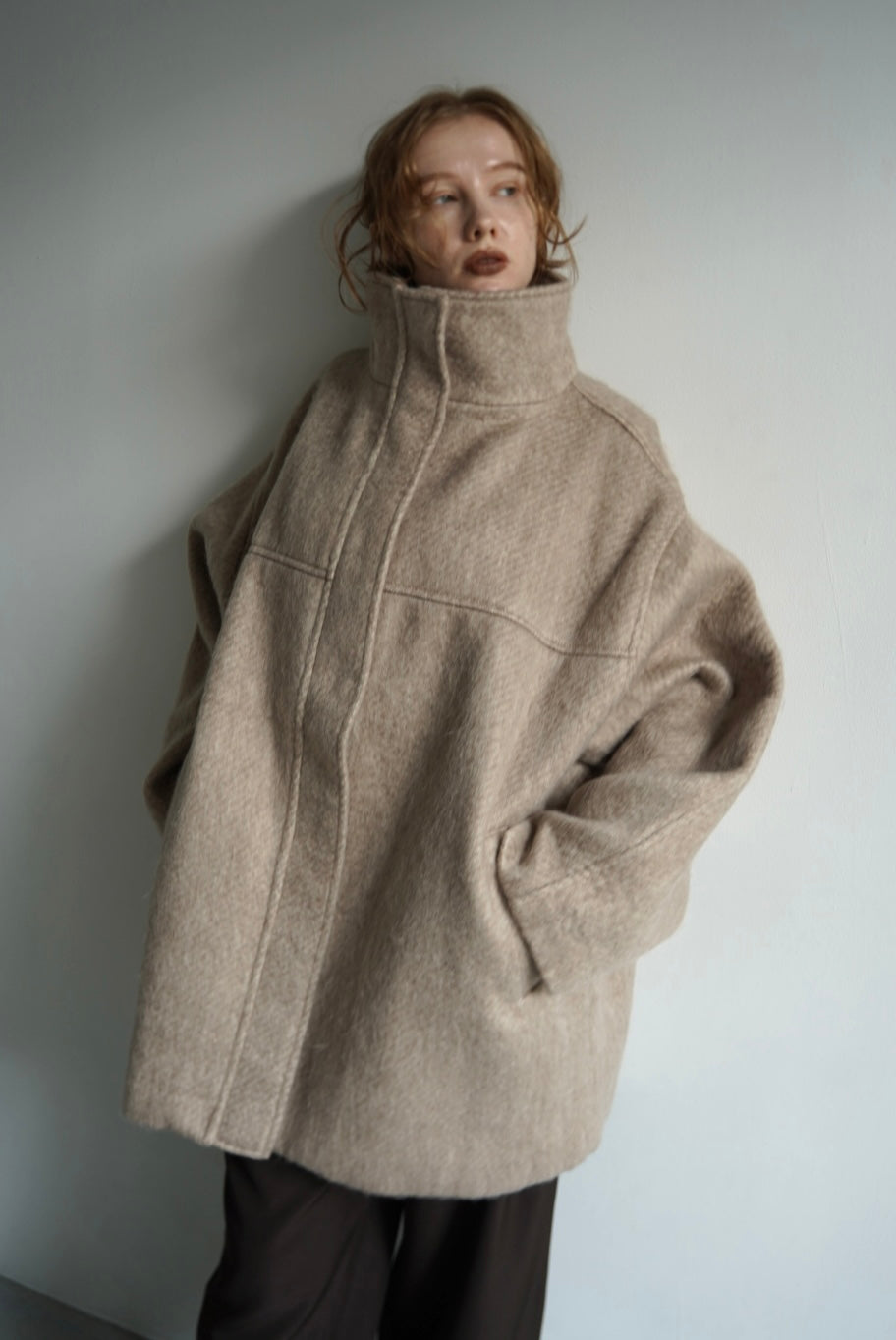 Stand shaggy over coat