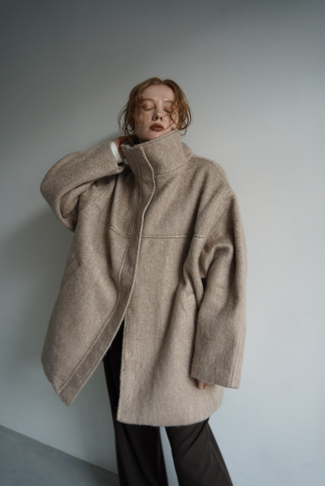 Stand shaggy over coat