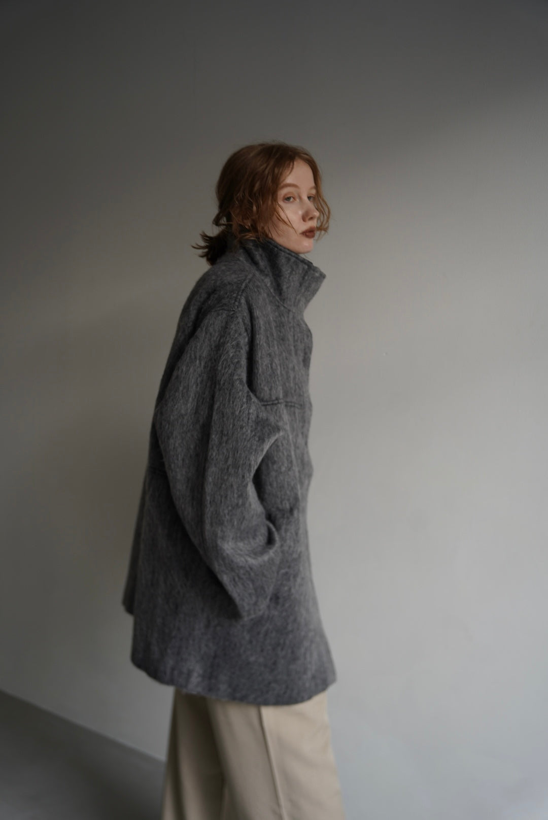 Stand shaggy over coat